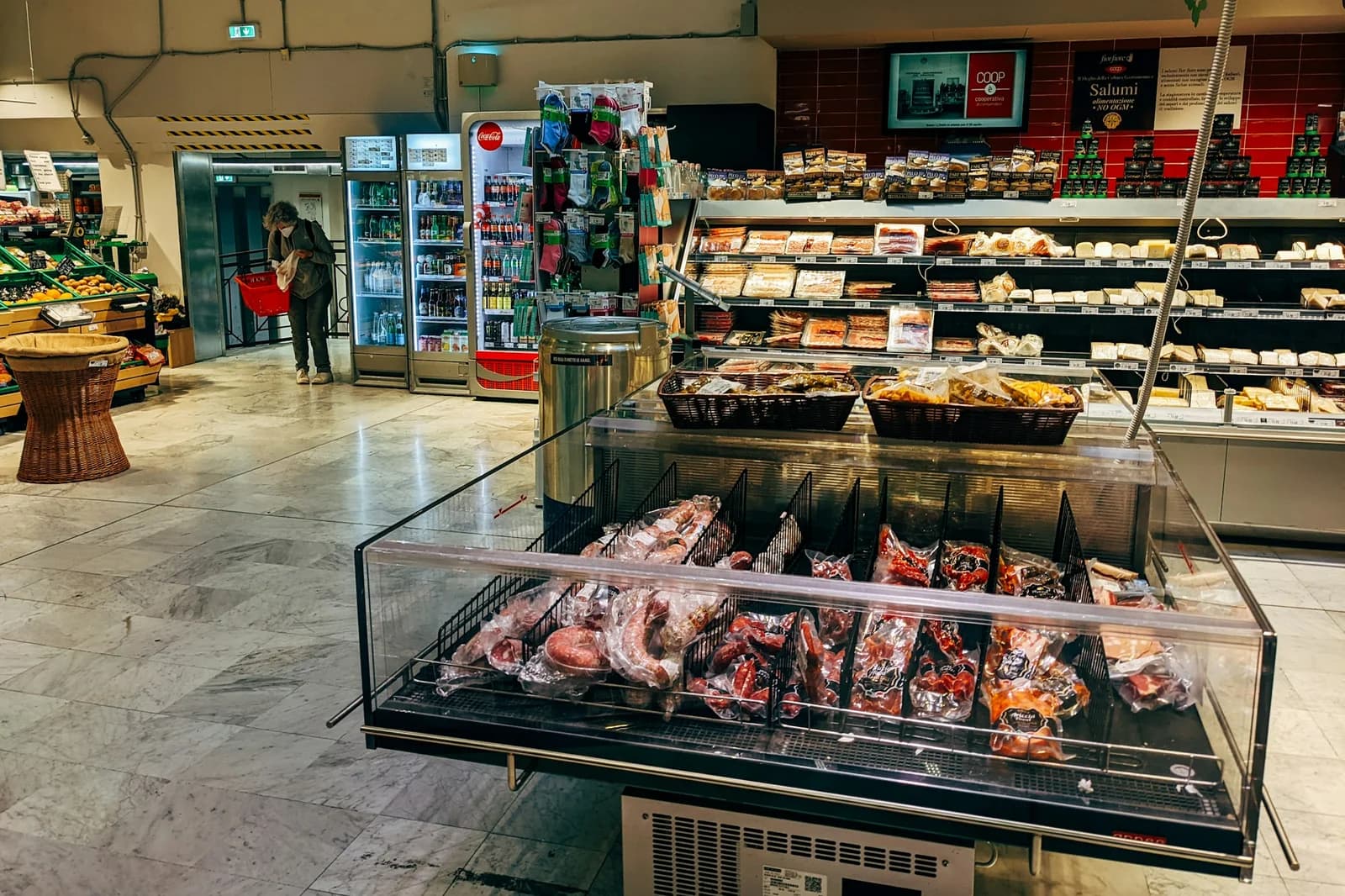 A real supermarket with mixed departments and working shelf conditions